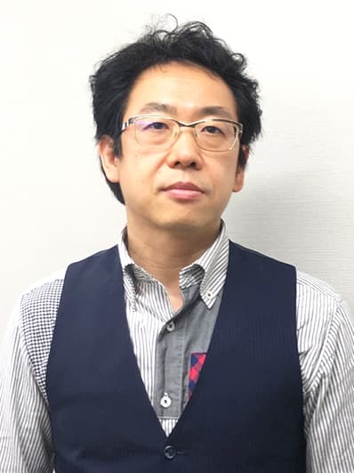 米山 賢司